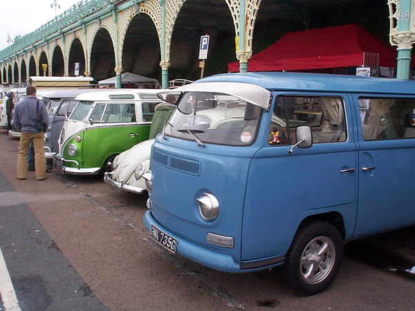 Row of vans and a Beetle