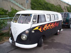White over black split screen camper with flames